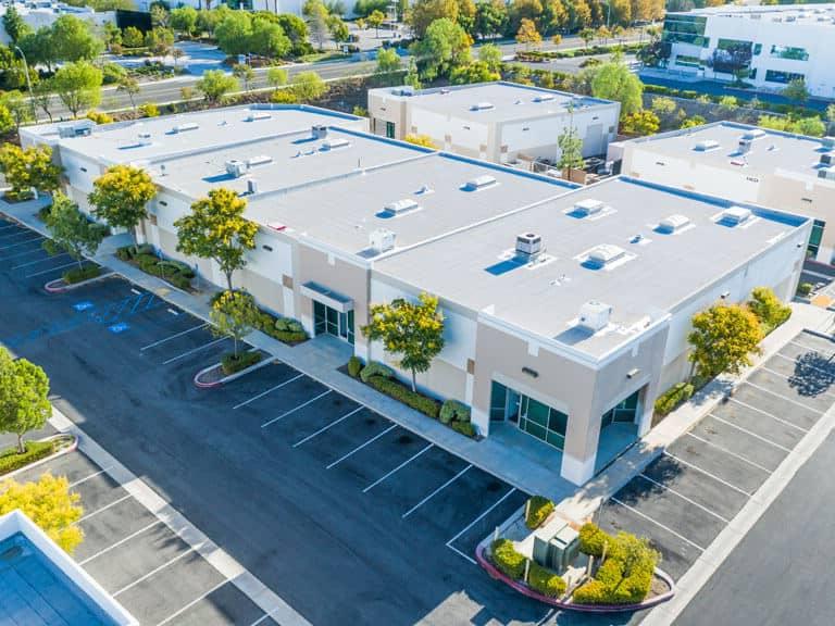 aerial view of industrial office building, a profitable commercial real estate investments